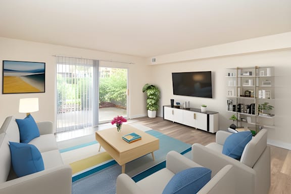 a living room with blue and white furniture and a television at Olde Towne in Kenwood, Cincinnati, 45243