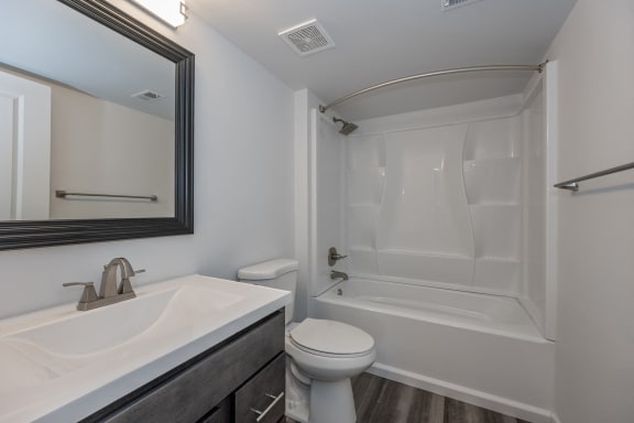 an empty bathroom with a sink toilet and shower at Ivy Hills Living Spaces, Cincinnati, 45244