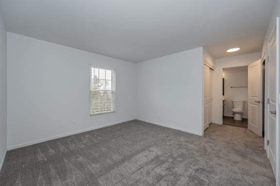 an empty living room with a toilet and a bathroom at Ivy Hills Living Spaces, Cincinnati, Ohio