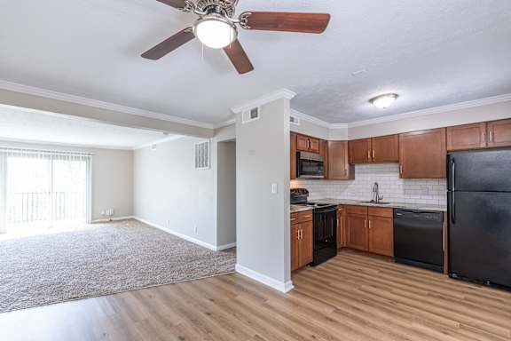 Kitchen with black appliances at Trails at Mariemont, Cincinnati, OH, 45227