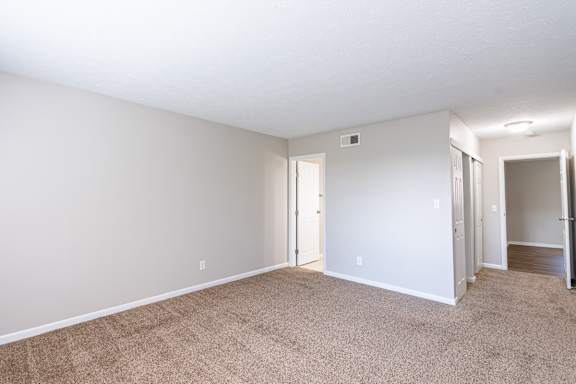 Spacious bedrooms with carpeted floor at Trails at Mariemont, Cincinnati, OH, 45227
