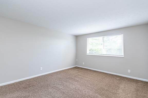 Spacious carpeted room with window at Trails at Mariemont, Cincinnati, OH, 45227