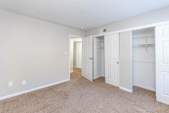Spacious carpeted room with closets at Trails at Mariemont, Cincinnati, OH