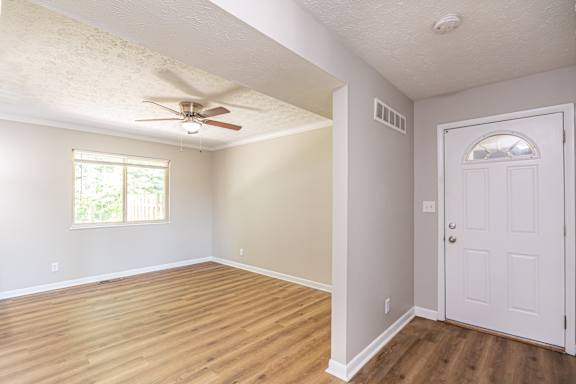 Spacious room with natural light and ceiling fan at Trails at Mariemont, Ohio, 45227