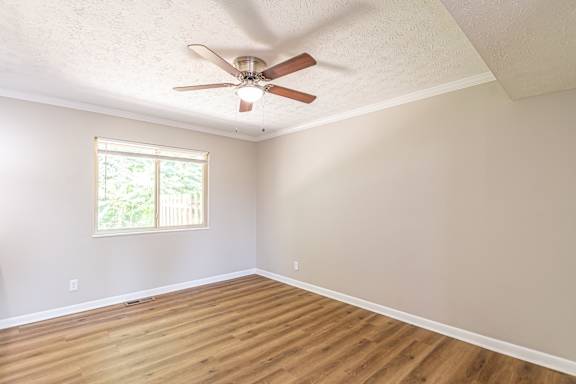 Spacious bedroom with a ceiling fan at Trails at Mariemont, Ohio