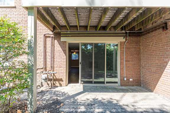 Patio area with door and window at Trails at Mariemont, Ohio, 45227