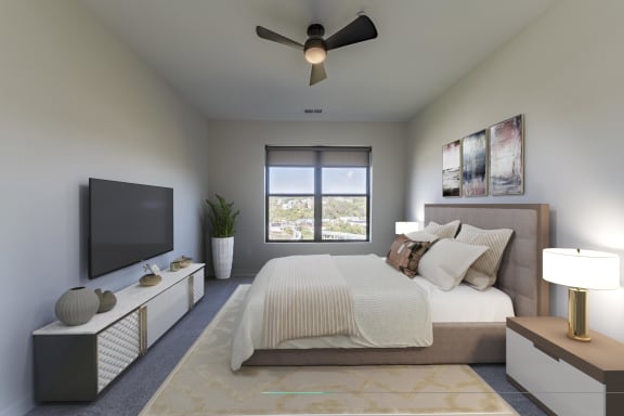 a master bedroom with a large bed and a tv at Adams Edge Apartments, Cincinnati, OH