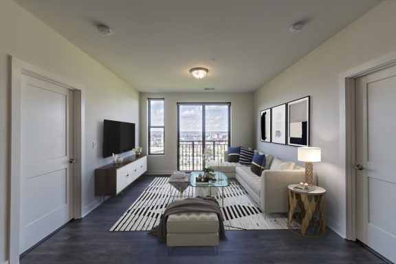 a living room with a couch and a coffee table at Adams Edge Apartments, Cincinnati