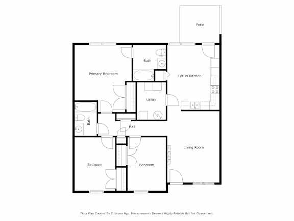 A floor plan of a house with a living room, two bedrooms, a bathroom, a utility room, and an eat-in kitchen.