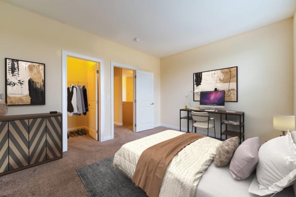 a bedroom with a bed and a desk with a computer  at Grove City Summit, Grove City, 43123