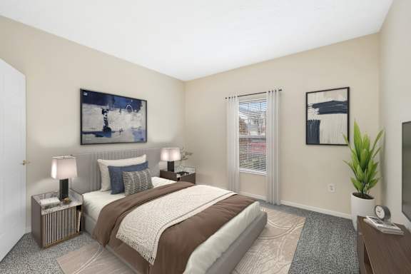 A bedroom with a large bed and a painting on the wall.