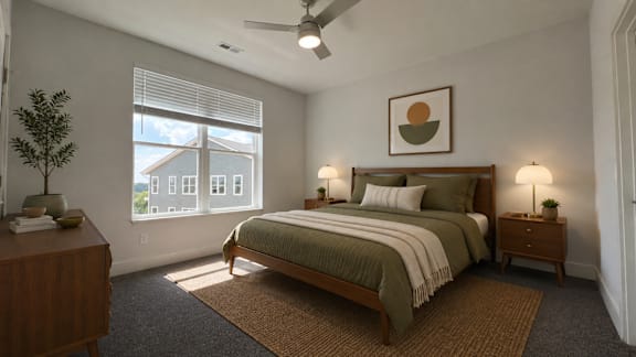 A bedroom with a bed, nightstand, and window.