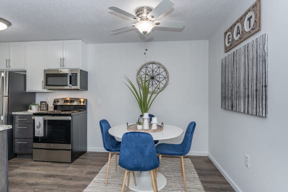 our modern kitchen and dining area is open to the living room