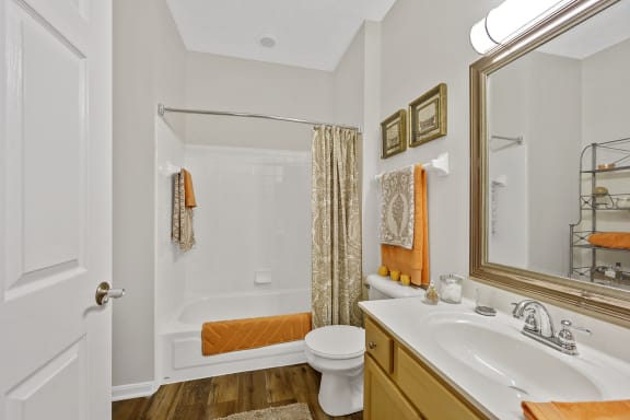 a bathroom with a shower toilet and sink and a mirror at Bishops Gate, Cincinnati, OH, 45249
