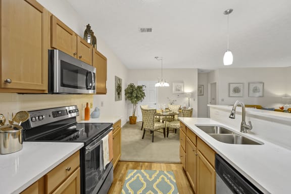 Kitchen with appliances at Bishops Gate, Cincinnati, OH