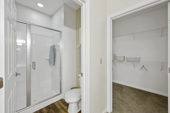 a bathroom with a shower and a toilet at Bishops Gate, Cincinnati