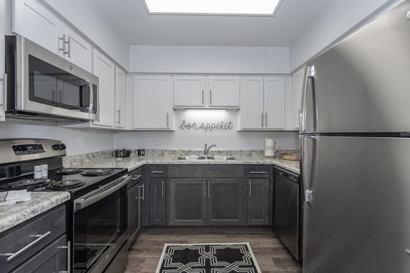 Kitchen area with appliances at Bloomfield Apartments, Dayton