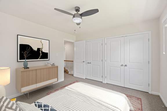 A bedroom with a bed, dresser, and a painting on the wall.