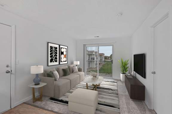 A living room with a grey couch, a coffee table, and a painting on the wall.