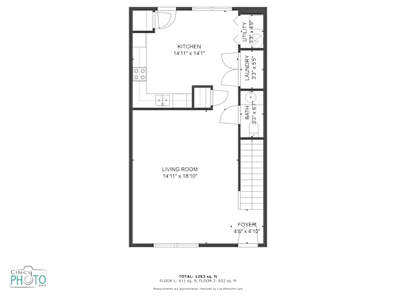 A floor plan of a small apartment with a living room, kitchen, and bathroom.
