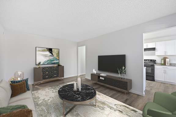 A modern living room with a black coffee table and a flat screen TV.