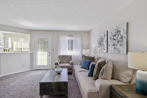 a living room with a couch and a coffee table