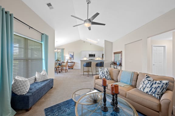 Living room with a couch and a table at Four Bridges, Liberty Township, OH, 45044-8380