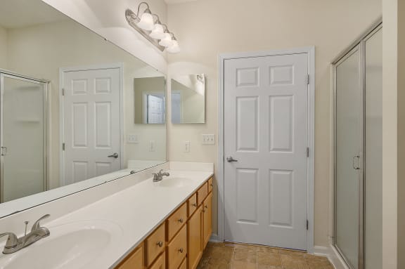Bathroom with a sink and a mirror and a shower at Four Bridges, Liberty Township, 45044-8380