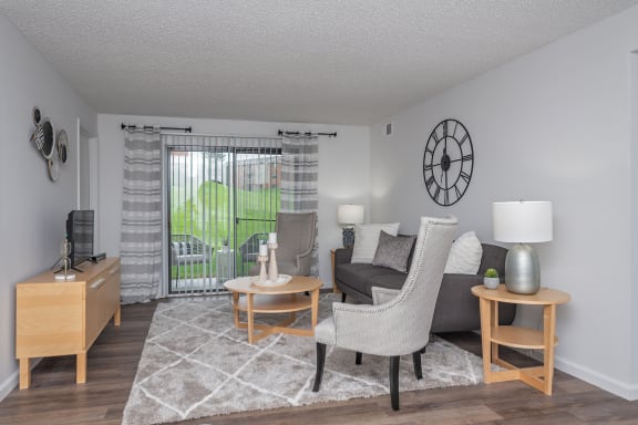 our apartments have a living room with a couch and a table
