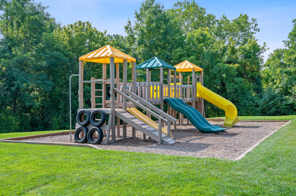 Playground with a slide and other playground equipment at Galbraith Pointe Apartments and Townhomes, Cincinnati, 45231