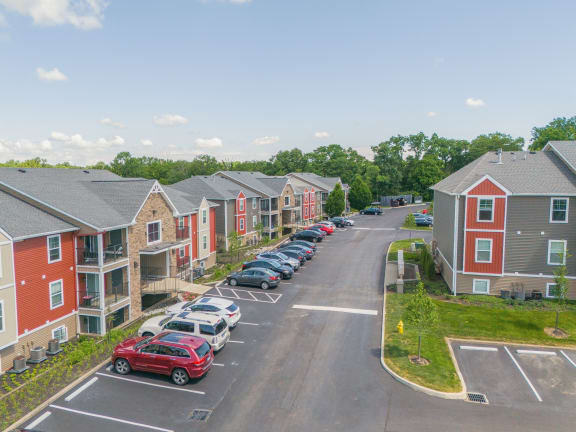 Aerial view of an apartment complex with cars parked on the street  at Hilltop Apartments, Ohio