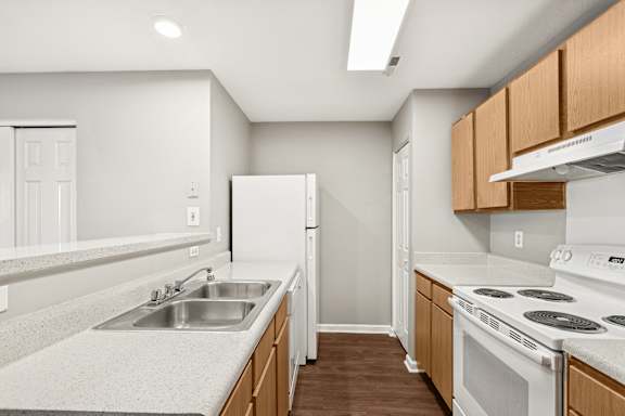 A kitchen with sink at Waterfront Pointe, Indianapolis, IN