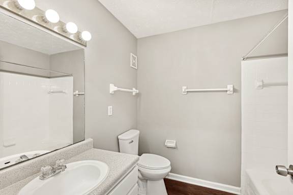 white toilet with a sink at Waterfront Pointe, Indianapolis, 46214