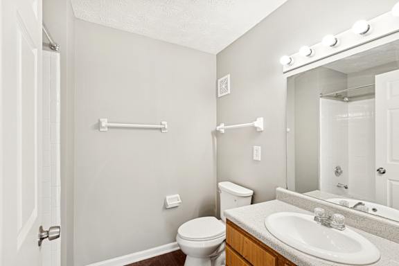 white bathroom with lights at Waterfront Pointe, Indianapolis Indiana