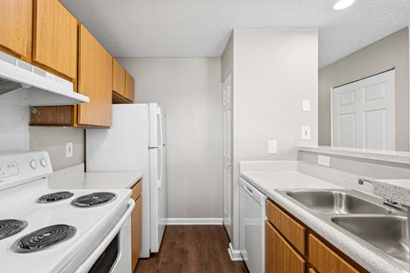 A kitchen with with refrigerator at Waterfront Pointe, Indianapolis, IN 46214