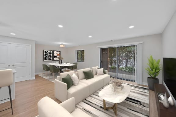 a living room with a couch and a table at Indian Creek Apartments*, Ohio