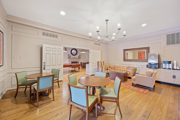 a living room with a table and chairs and a kitchen at Indian Creek Apartments*, Cincinnati, 45236