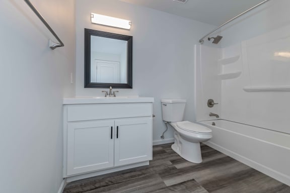 a bathroom with a toilet and a sink and a shower at Ivy Hills Living Spaces, Cincinnati, Ohio