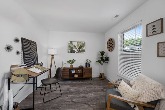 a living room with a desk and a rug at Ivy Hills Living Spaces, Cincinnati, Ohio