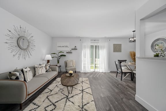 a living room with a couch and a coffee table at Ivy Hills Living Spaces, Cincinnati