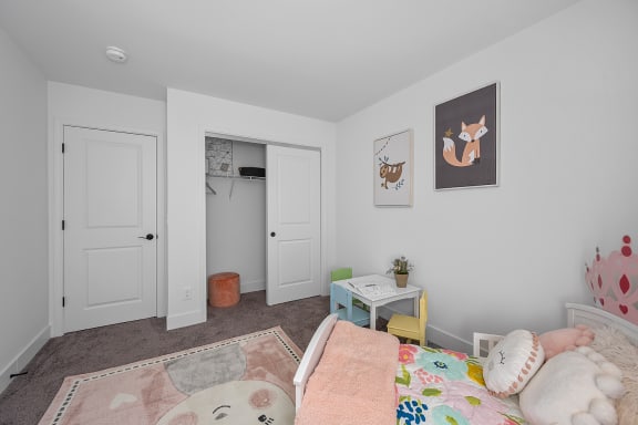 a bedroom with a bed and a closet at Ivy Hills Living Spaces, Cincinnati, OH, 45244