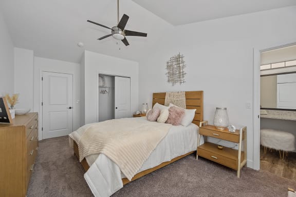 a bedroom with a bed and a ceiling fan at Ivy Hills Living Spaces, Cincinnati, Ohio