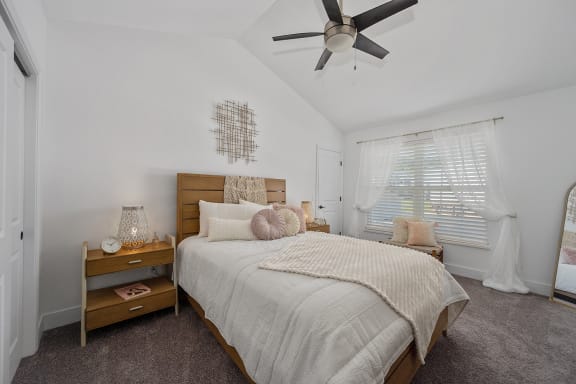 a bedroom with a large bed and a ceiling fan at Ivy Hills Living Spaces, Ohio, 45244
