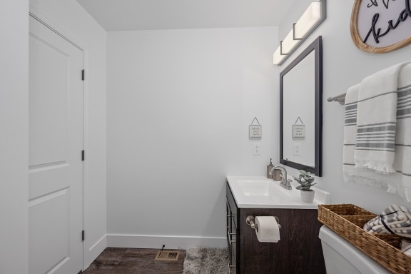 a bathroom with a sink and a mirror at Ivy Hills Living Spaces, Cincinnati
