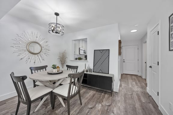 a dining room with a table and chairs at Ivy Hills Living Spaces, Cincinnati