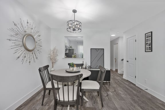 a dining room with a round table and chairs at Ivy Hills Living Spaces, Cincinnati, 45244