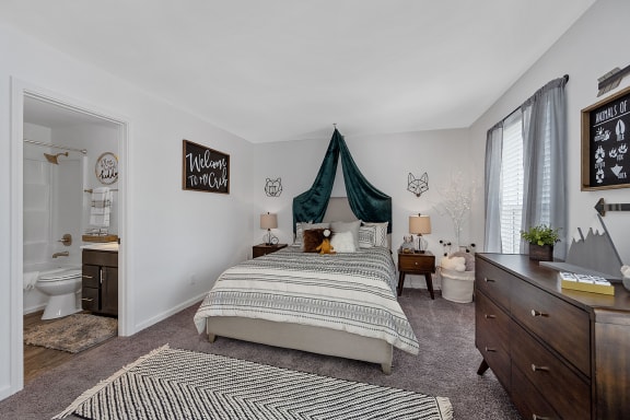 a bedroom with a bed and a bathroom at Ivy Hills Living Spaces, Cincinnati, 45244