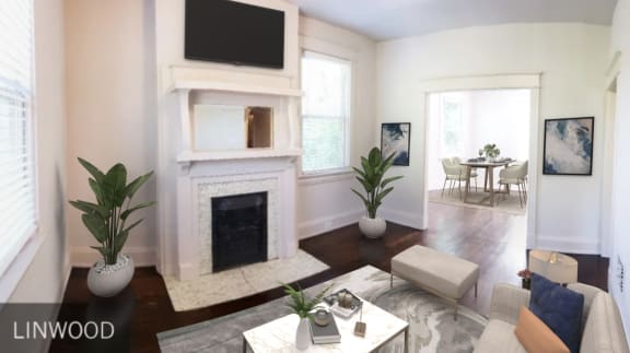 a living room with a fireplace and a television at Cincinnati Premier Living*, Cincinnati, Ohio