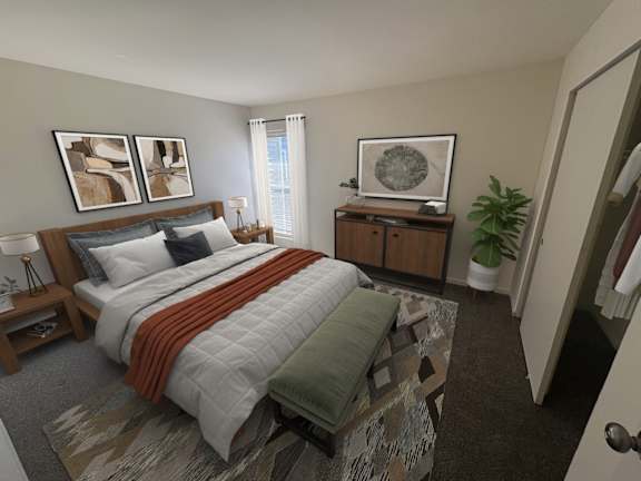 A bedroom with a bed, nightstand, and a plant.