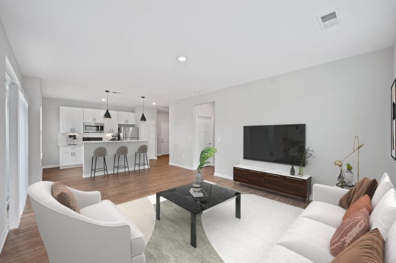 a living room with a couch and a coffee table at Monmouth Row Apartments, Newport, Kentucky